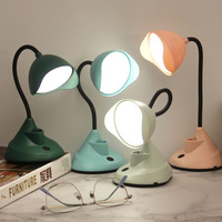 Vente en gros Veilleuse LED créative avec charge USB Lampe de bureau pliante Économie d'énergie Apprendre à lire Lampe de table