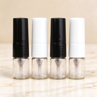 Atomiseur de parfum rechargeable en verre transparent de 1 ml pour la vente en gros, mini flacon de voyage avec capuchon noir/blanc et pulvérisateur à brume fine