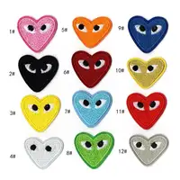 Graphic heart with eyes logo, iron on patch, applique, motif in dark blue,  red, black