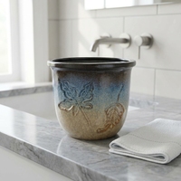 Grand pot en céramique en forme de coquillage avec texture spirale, glaçure réactive marron et bleue, décoration côtière, vente en gros