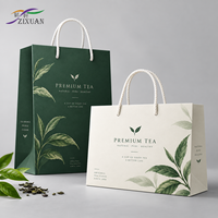 Sac shopping en papier de luxe personnalisé avec poignée en corde, impression de logo, finition mate pour l'emballage de vêtements de mode en détail