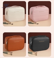 Sac de maquillage portable de voyage en PU de grande capacité, couleur unie, avec logo personnalisé pour femme, vente en gros