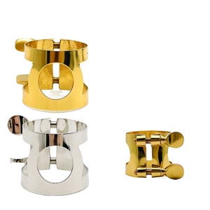 <span class=keywords><strong>Ligature</strong></span> de <span class=keywords><strong>saxophone</strong></span> <span class=keywords><strong>alto</strong></span> Eb <span class=keywords><strong>Ligature</strong></span> d'anche à anneau en métal <span class=keywords><strong>pour</strong></span> embout en caoutchouc dur Accessoire d'instrument de musique durable - Product Image 1
