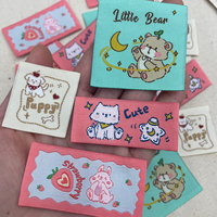 Étiquettes tissées personnalisées superbes avec motifs d'animaux de dessin animé pour vêtements d'enfants