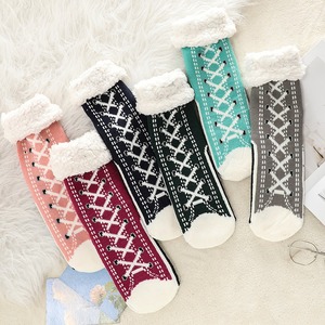 Best-seller Chaussons en tricot torsadé pour femme Chaussettes d'hiver épaisses et chaudes doublées en Sherpa Chaussettes pelucheuses - Product Image 1