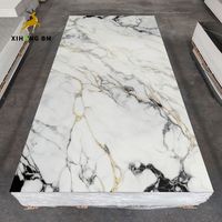 Meilleure vente en gros 1220x2440 Panneau mural en marbre PVC Panneau en PVC pour salles de bain et chambres à coucher Écologique et non toxique