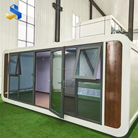 Maison conteneur modulaire de 20 pieds, couleur personnalisée, avec panneaux sandwich respirants, design moderne pour hôtels (garantie 1 an)