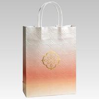 Sacs en papier gaufré de luxe avec accent doré, matériau épais et durable pour emballages cadeaux haut de gamme et cadeaux de mariage