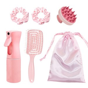 Set de cuidado capilar rosa con peine de masaje, botella de spray y scrunchies para peinar e hidratar el cabello de las mujeres - Product Image 1