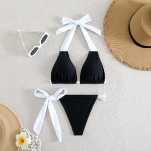 Nuevo bikini de comercio electrónico transfronterizo, de color liso, sexy y moderno, con tirantes y cuello halter, directo de fábrica. - Product Image 1