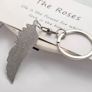 Porte-clés personnalisé rétro en alliage de zinc, style européen et américain, avec pendentif ailes d'ange à plume unique, accessoires de sac, vente en gros - Product Image 4