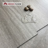 Wasserdichter Feuerfester 7mm SPC-Bodenbelag Holzoptik PVC Klicksystem LVT Vinylplanken Modernes Heim- und Büroniveau Rutschfeste Kunststofffliesen