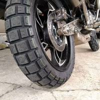 إطارات دراجات نارية مطاطية جديدة بدون أنبوب داخلي من نوع CST CM-AD01 للاستبدال/الإصلاح تناسب الجنوط مقاس 19 بوصة (110/80-19)