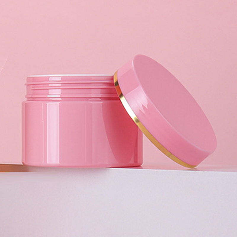 Pink 68mm bottle with pink lid with golden line