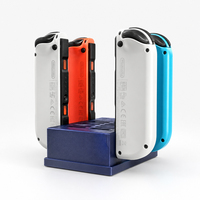 Base de charge 4-en-1 pour accessoires de jeu Nintendo Switch, capable de charger quatre manettes