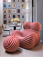 Fauteuil de salon minimaliste italien ergonomique et incurvé en tissu élastique effet soie glacée pour la détente