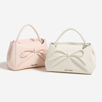 Nouveau sac à main uni avec nœud mignon pour jeunes filles, style simple et tendance, sac fourre-tout polyvalent pour le quotidien