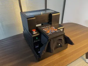 ماكينة طباعة DTG رقمية أوتوماتيكية بالكامل على مقاس A4 للطباعة على القمصان المخصصة مباشرة معتمدة بشهادة CE