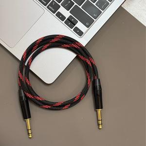 Cable de audio de 6.3mm TRS macho a macho, trenzado con nailon blindado, para guitarra, bajo, teclado, audio y video. - Product Image 1