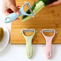 Poignée en plastique Gadget de cuisine Éplucheur de légumes Éplucheur de pommes de terre fruits portable