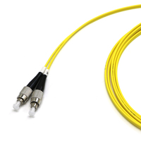 Kabel Patch Komunikasi Singlemode Duplex 15m dengan Jaket PVC LSZH, UPC ST, dan UPC FC