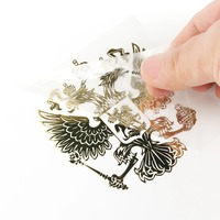 Fabricant d'autocollants UV personnalisés en métal à transfert transparent imprimés avec logo doré pressé impression d'autocollants d'étiquettes en 3d
