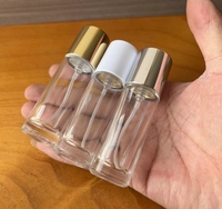 Flacons de parfum en verre ronds fantaisie de nouvelle conception en gros, 10 ml, 12 ml, 15 ml, avec pompe à col sans sertissage facile