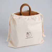 Pochette en toile de coton avec cordon de serrage, logo personnalisé imprimé à l'écran, sac d'emballage réutilisable pour les marques de sacs