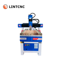 Petit routeur CNC 2x3 pieds publicité bois routeurs CNC Machine 6090 avec roue de pression pour bois MDF teck chêne