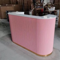Vente en gros de nouveaux comptoirs de réception en bois massif courbé pour boutique de vêtements de mode moderne, hôtel, salon