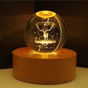 Weihnachts kristall kugel geschenk Benutzer definierte 3D-Lasergravur Logo Kristallglas kugel mit Spieluhr basis