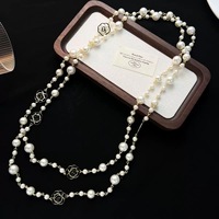 Collier long élégant à double rangs avec perles et fleurs noires ajourées, motif camélia, style français, bijou populaire, Collier De Camelia