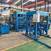 Machine automatique hydraulique QT4-15 pour la fabrication de briques creuses en béton, de pavés et de briques de sol emboîtables
