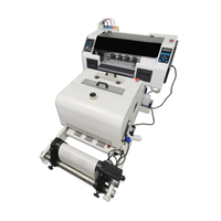 Imprimante DTF automatique numérique à grande vitesse avec encre pigmentée Système tout-en-un l'impression de vêtements en vrac