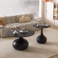 Table basse design en métal et pierre pour petit appartement, combinaison créative pour salon, table d'appoint noire haut de gamme pour canapé