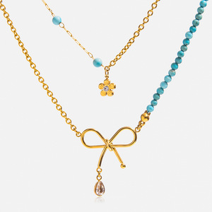Collier pendentif en acier inoxydable avec perles turquoise bleues, design nœud papillon, bijoux cadeau - Product Image 1