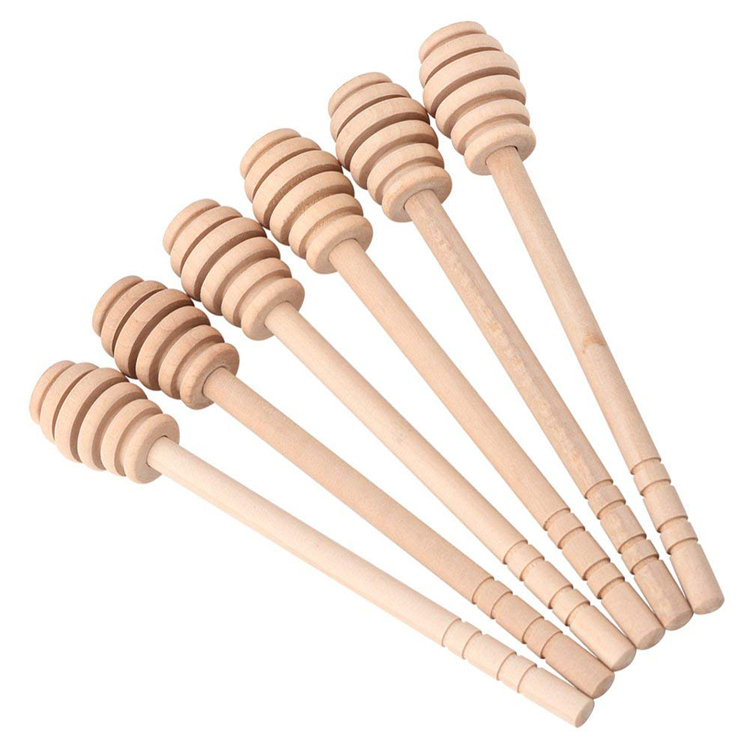 Premium Photo | Two Wooden Honey Spoons Isolated On White - View #4