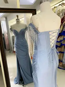 Blu polveroso con spalle scoperte corsetto strass maglia lucida sirena plissettata a mano abito lungo da sera abito da ballo 2025