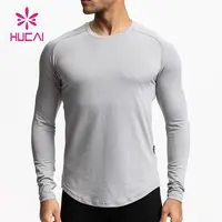 Özel yeni ipek yumuşak kuru fit o boyun kurulan uzun kollu açık gri spor giyim erkek gömlek koşu gömlek