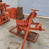 Machine à briques en argile manuelle à usage domestique, machine à fabriquer des blocs rentable à petite échelle, vente chaude