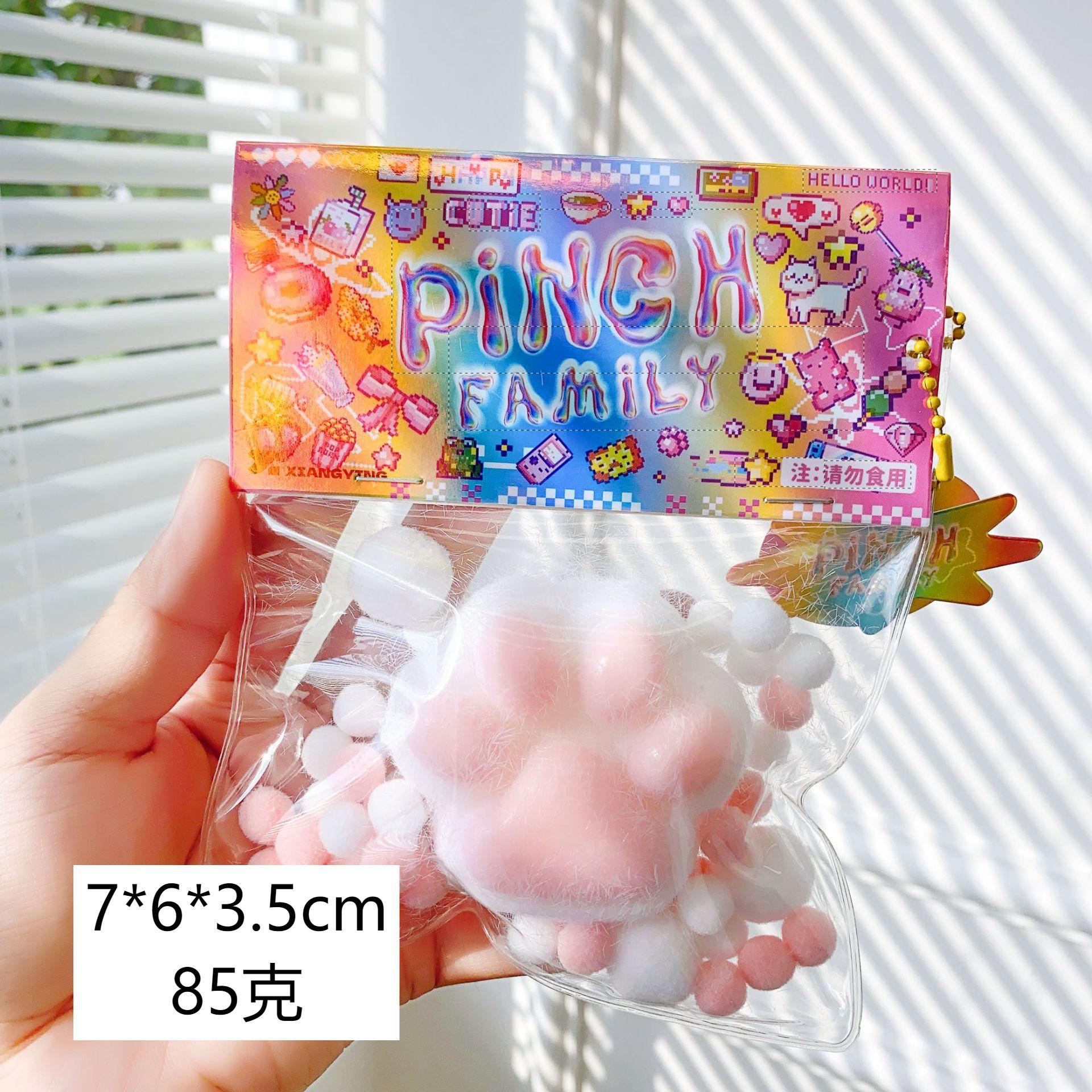 Peluche patte de chat blanche