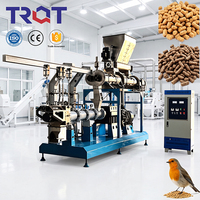 Extrudeuse à double vis pour aliments pour animaux de compagnie, de pointe dans l'industrie, à haut rendement, de type humide, pour aliments pour poissons, machine à granulés pour aliments pour chiens