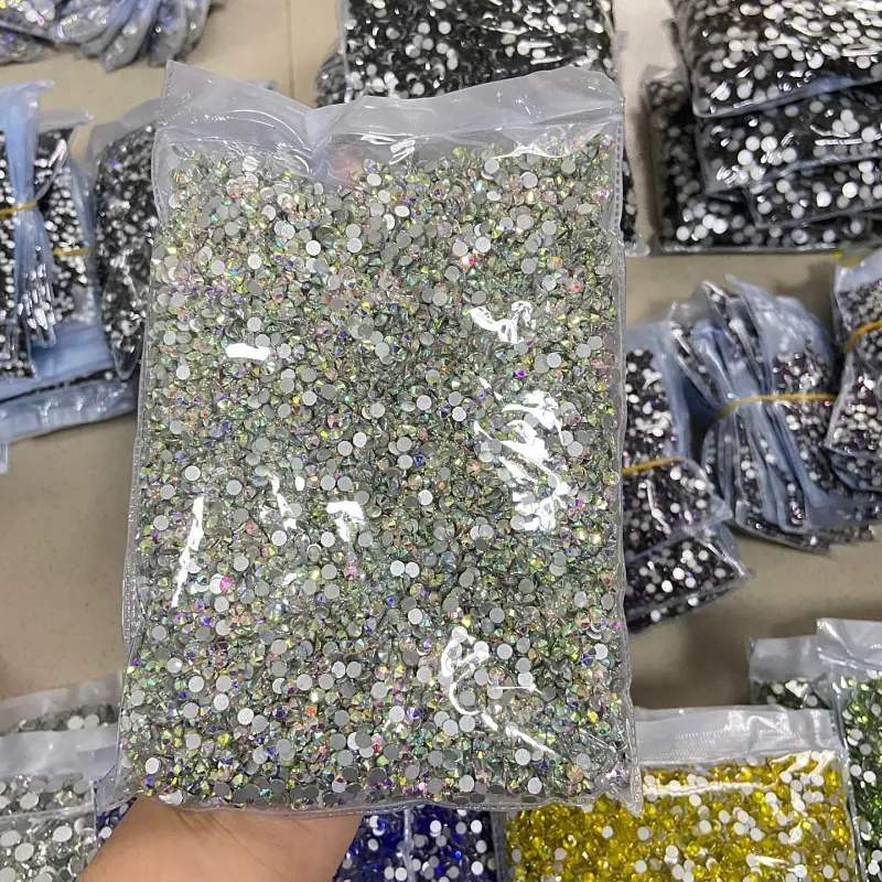 Großhandel Lager Verschiedene Größen & Farben 100 Brutto Glas Strass Flatback Bling 20000 Nagel Strass für dekorative Handwerk