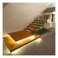 Escalier résidentiel en acier moderne Smart Led marche ouverte contremarche en forme de L conception de marche intelligente escalier flottant