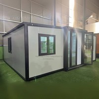 Maison conteneur extensible à double aile avec fenêtres, structure en acier modulaire, pour centres commerciaux et hôtels, design moderne, fournie directement par l'usine