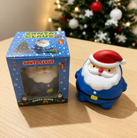 Jouet Squishy Père Noël multicolore festif et très populaire, emballé individuellement dans une boîte cadeau, idéal pour les cadeaux de Noël