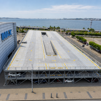 Structure de stationnement en acier haute performance, système multi-niveaux pour un stockage efficace des concessionnaires automobiles