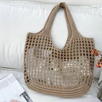 Bolso de playa tejido a mano de alta calidad para mujer, diseño sencillo, bolsos de mano elegantes huecos para mujer con logotipo impreso personalizado
