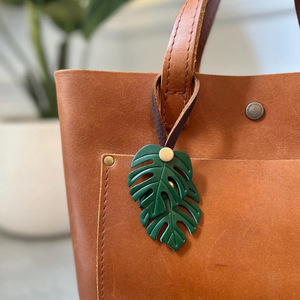 In stock: Monstera leaf PU leather <b>bag</b> <b>charm</b>, Bohemian style keychain, vintage car keychain - Product Image 1