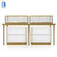 Table de présentation de bijoux de luxe sur mesure, directement de l'usine Baishida, vitrine en verre avec cadre doré et éclairage LED
